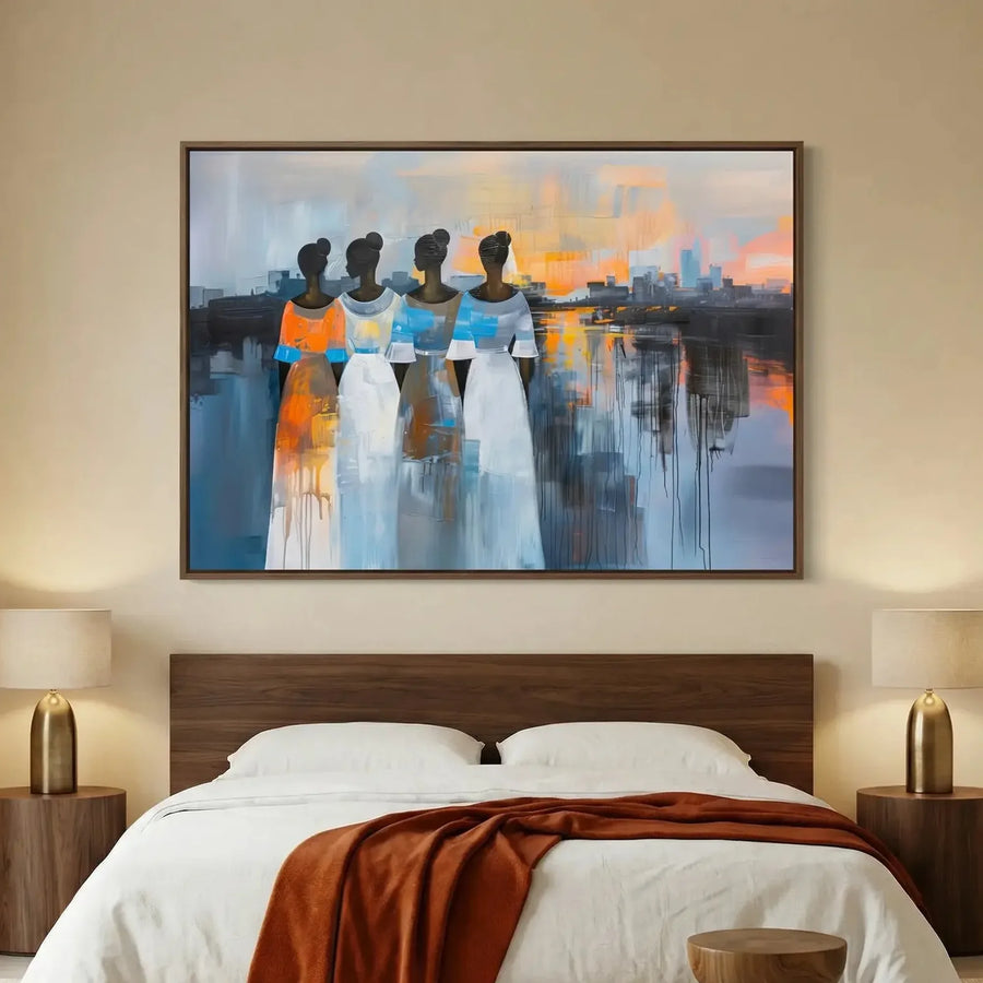 African American art for bedroom in modern bedroom with walnut platform bed and brass lamps, four Black women at sunset. Digital mockup.