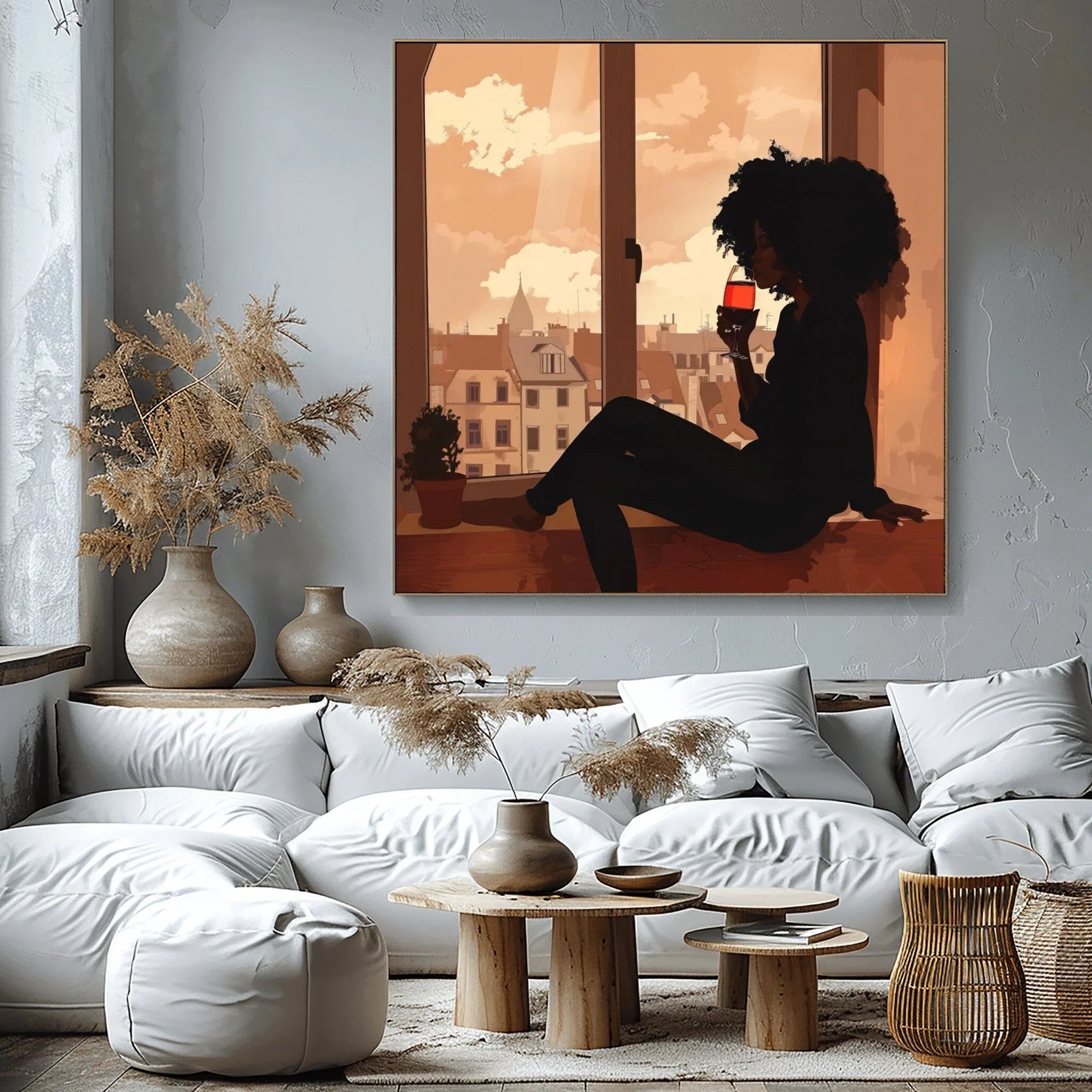Afrohemian home decor wall art in living room with white cloud sofa, wooden spool tables, pampas grass vases, grey textured. Digital mockup.