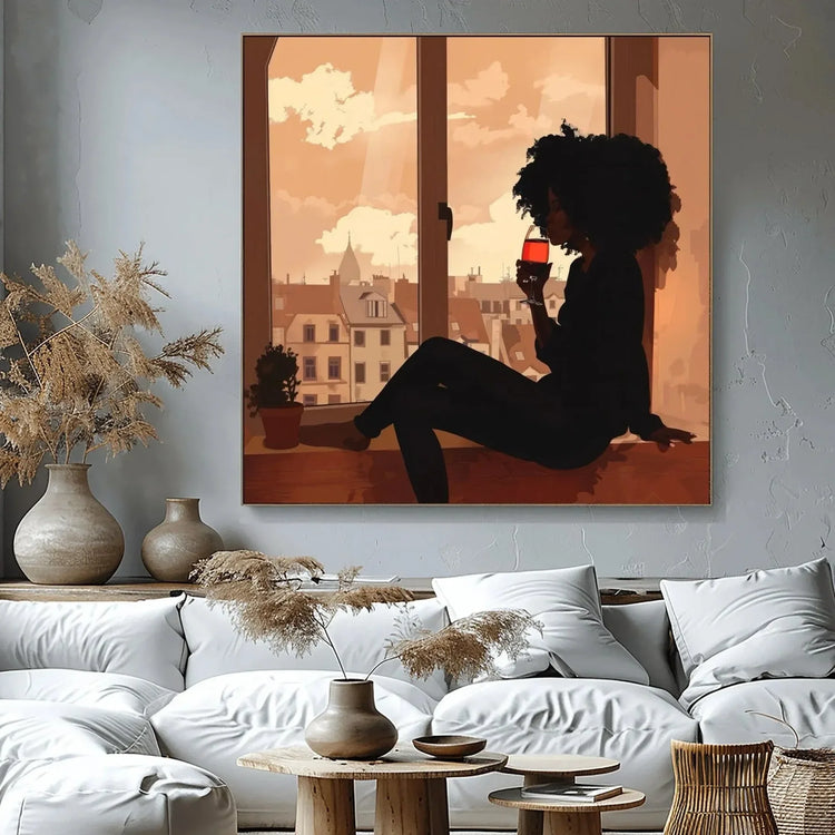 Afrohemian home decor wall art in boho living room with mudcloth pillows and brass tray, Black woman wine silhouette. Digital mockup.