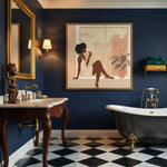 Afrocentric in bathroom with Luxe navy bathroom with clawfoot tub, marble floor, and gold fixtures. Digital mockup.