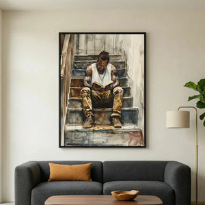 Black art for living room in modern living room with gray sofa and fiddle leaf, watercolor of Black man reading. Digital mockup.