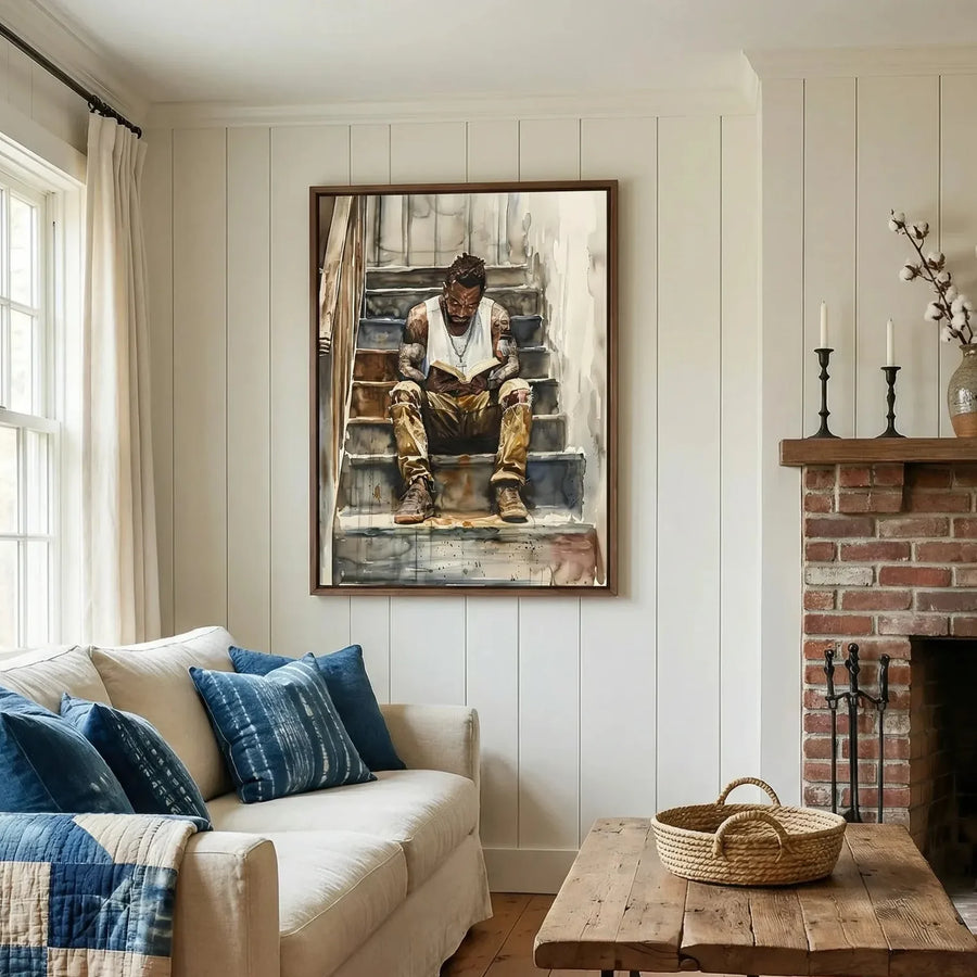 Black farmhouse wall decor in shiplap mudroom with patchwork quilt and wood bench, watercolor Black man reading on stairs. Digital mockup.