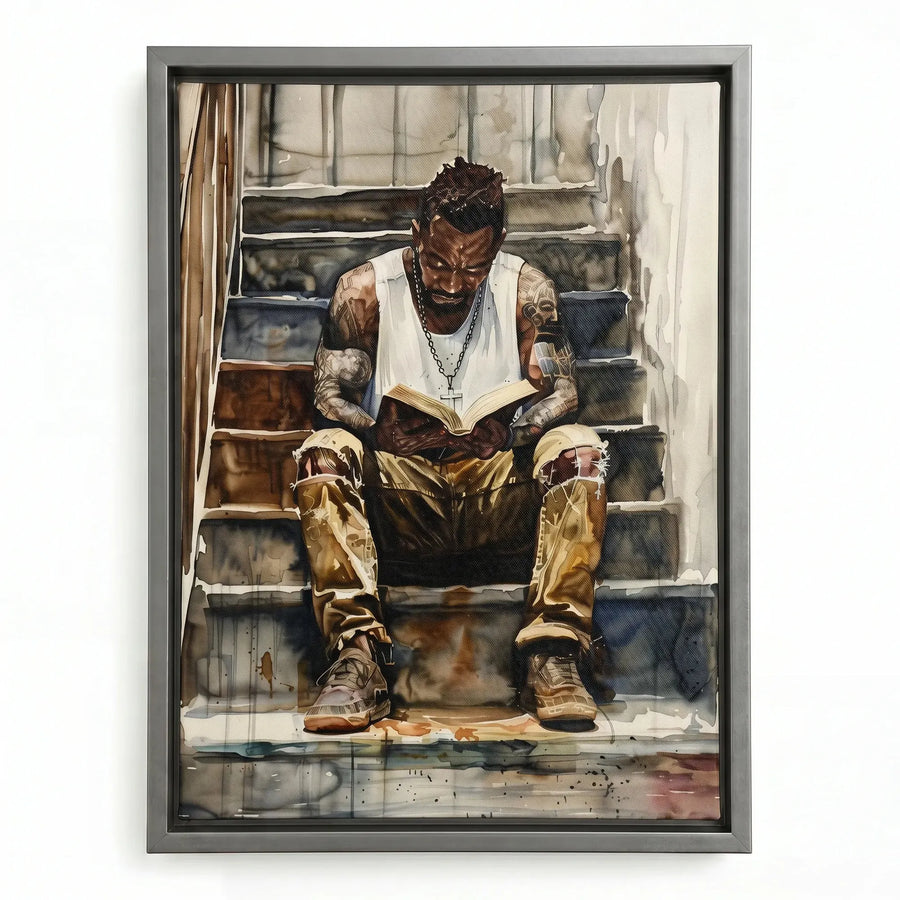Black man reading nook in silver floating frame, modern watercolor of tattooed Black man reading on stairs. Digital mockup.
