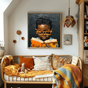 Black art for nursery walls in boho kids bedroom with daybed and mustard bedding, Black boy in orange glasses reading. Digital mockup.